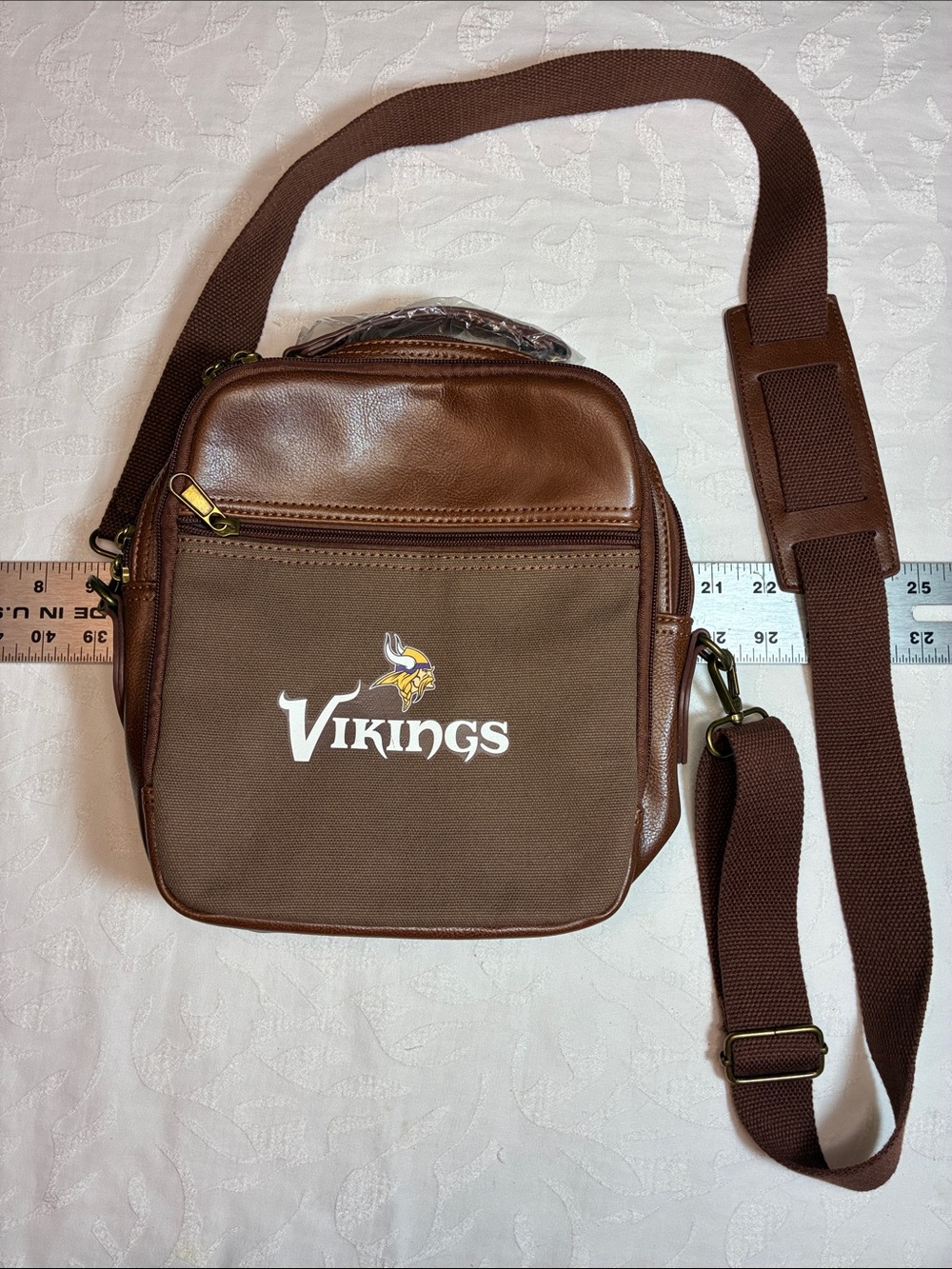 Women’s Vikings Crossbody Shoulder Bag. 10in wide x 11in tall.